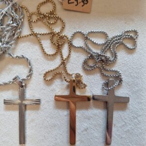 Kruisje goud/zilverkleurig