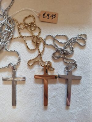 Kruisje goud/zilverkleurig